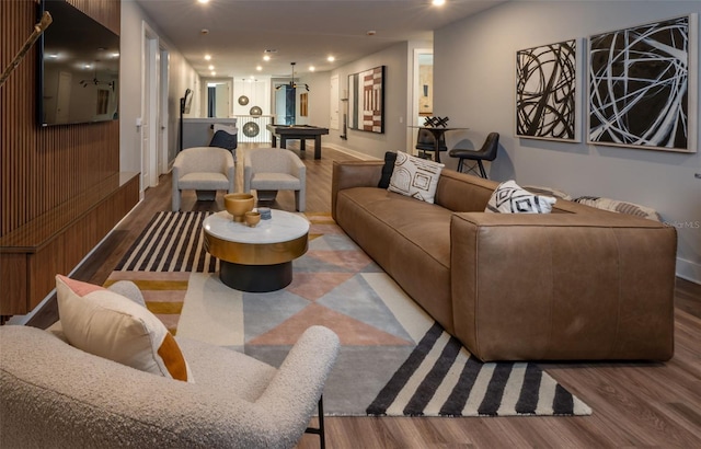 living room featuring recessed lighting and wood finished floors