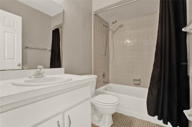 full bath featuring toilet, shower / bathtub combination with curtain, vanity, and tile patterned floors