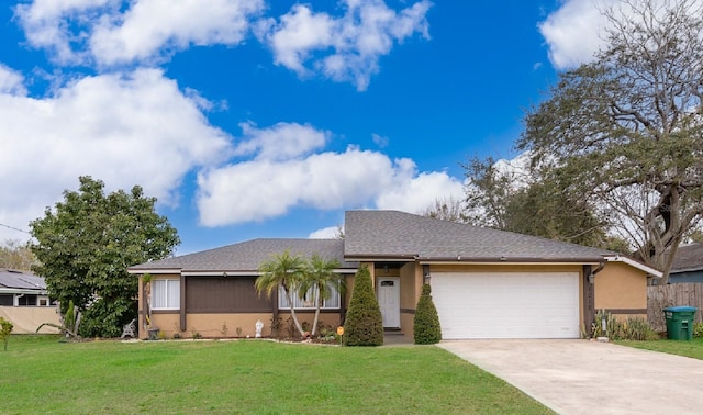 ranch-style home with an attached garage, driveway, a front lawn, and stucco siding