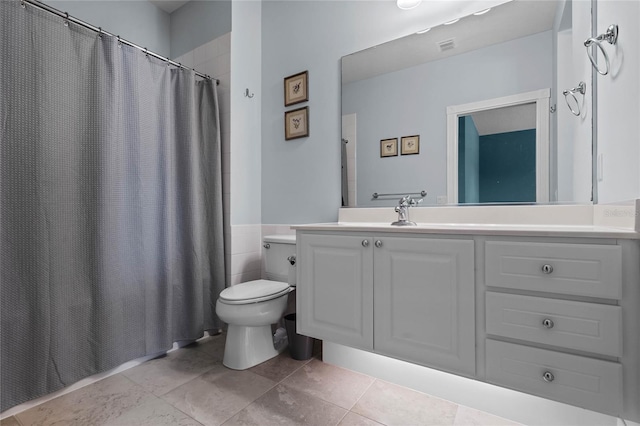 full bath featuring toilet, a shower with shower curtain, visible vents, vanity, and tile patterned floors