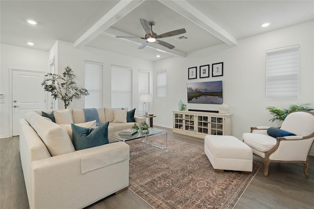 living area with recessed lighting, wood finished floors, a ceiling fan, baseboards, and beam ceiling