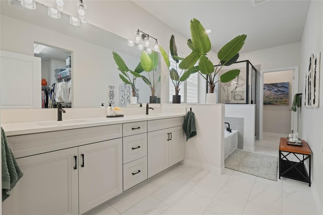 full bathroom with double vanity, a stall shower, a sink, marble finish floor, and a bath