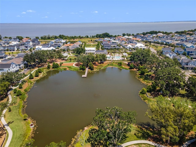 birds eye view of property featuring a residential view and a water view