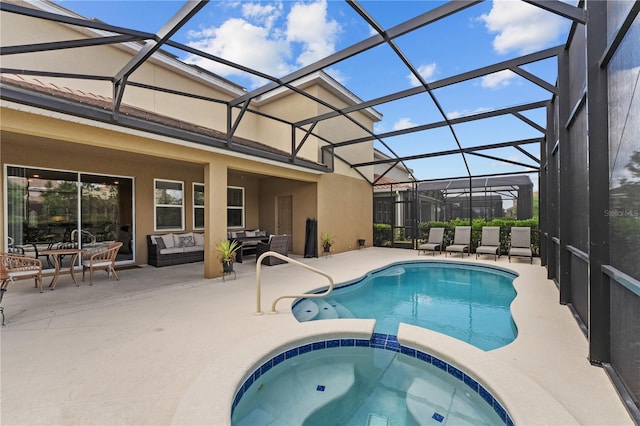 view of swimming pool with a patio area, a lanai, a pool with connected hot tub, and an outdoor living space