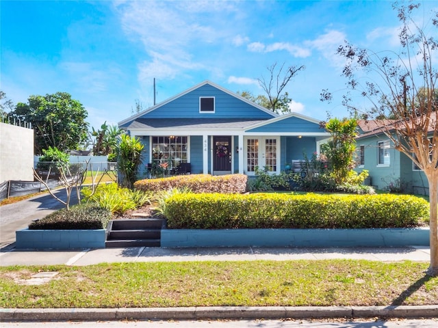 view of front of house with fence