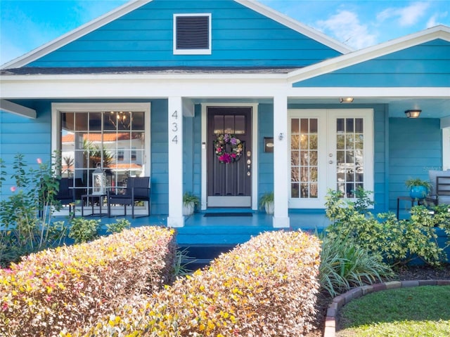 entrance to property featuring a porch