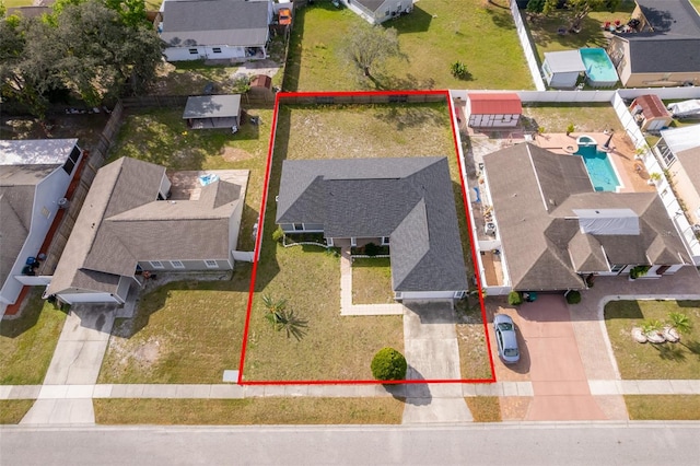 birds eye view of property with a residential view