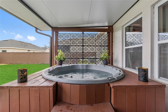 exterior space featuring a hot tub