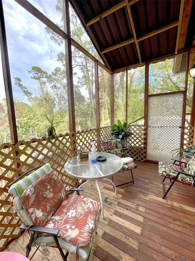 unfurnished sunroom featuring a wealth of natural light