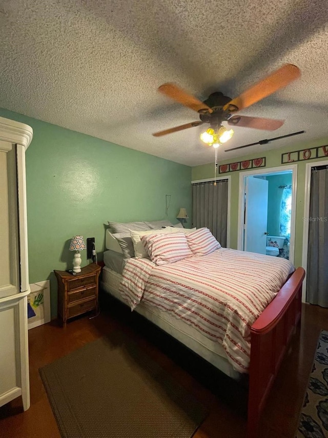 11213 River Grove Dr, Orlando, FL 32817 - bedroom featuring wood finished floors, a textured ceiling, and ceiling fan