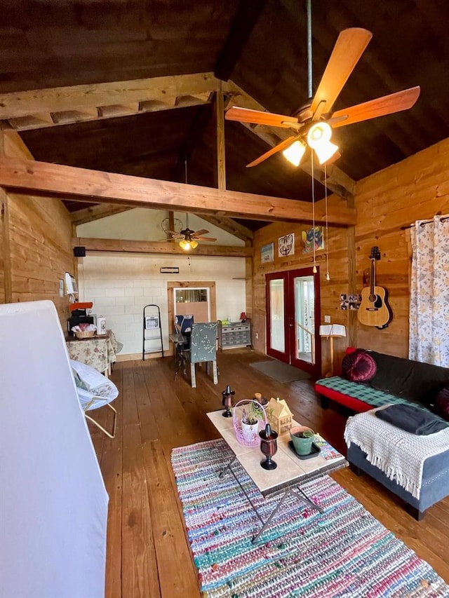 11213 River Grove Dr, Orlando, FL 32817 - living room with a ceiling fan, hardwood / wood-style floors, french doors, and wood walls