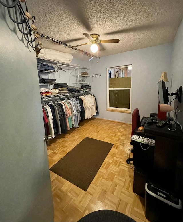 11213 River Grove Dr, Orlando, FL 32817 - spacious closet featuring a ceiling fan