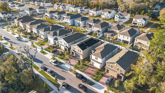 birds eye view of property with a residential view