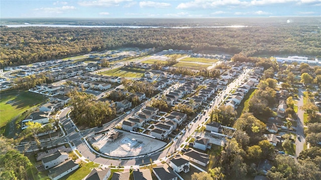 birds eye view of property with a residential view