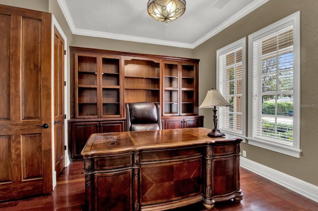 home office with dark wood-style floors, ornamental molding, and baseboards