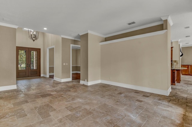 interior space with stone tile floors, an inviting chandelier, and baseboards