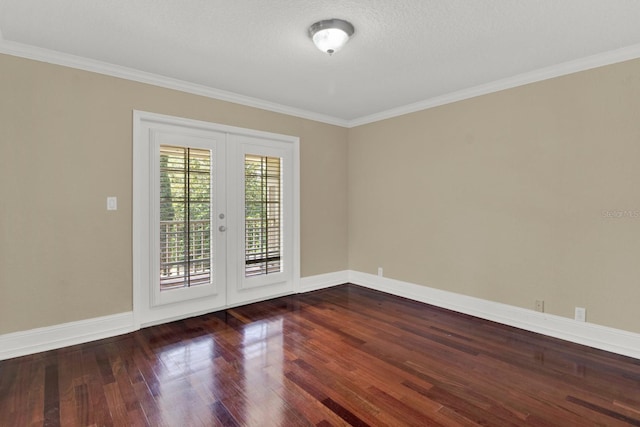 empty room featuring crown molding, french doors, wood finished floors, and baseboards