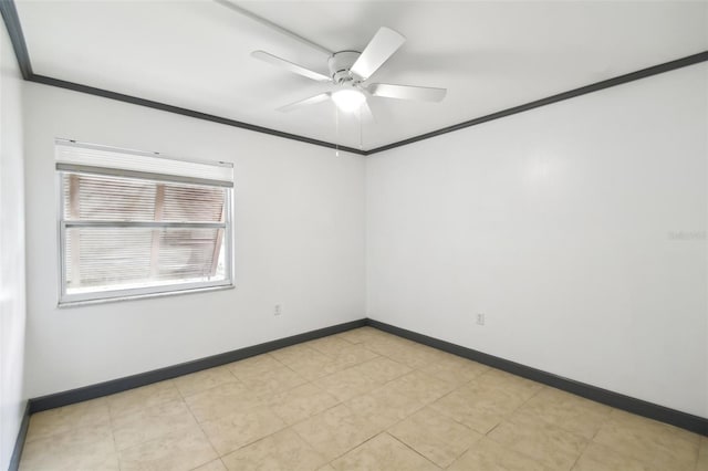 spare room featuring baseboards, a ceiling fan, and crown molding