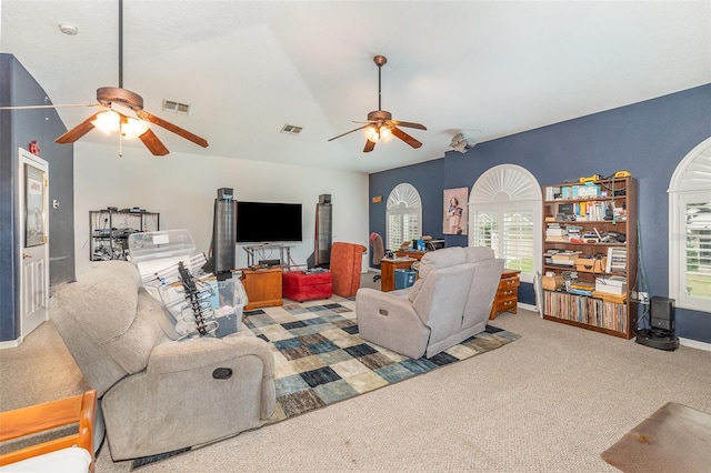 carpeted living room with ceiling fan, visible vents, and baseboards