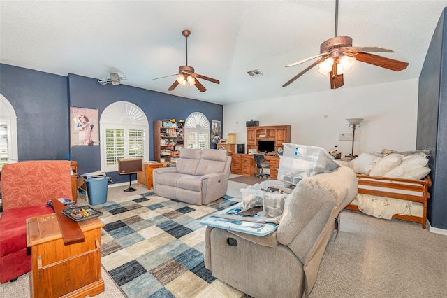 carpeted living room with a ceiling fan, visible vents, and baseboards