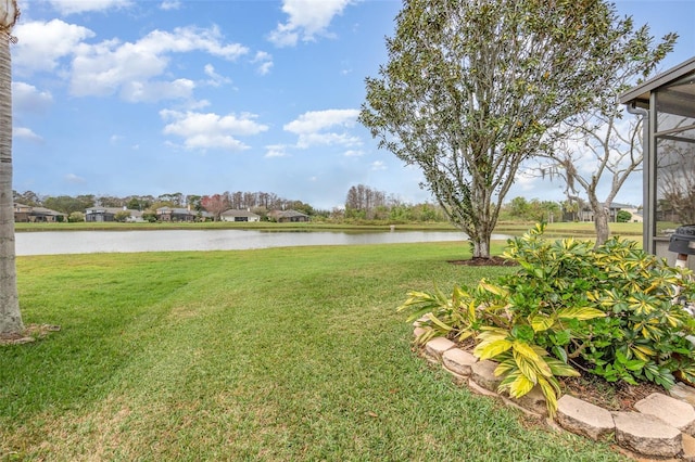 view of yard with a water view