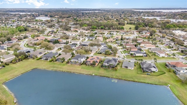 bird's eye view with a residential view and a water view