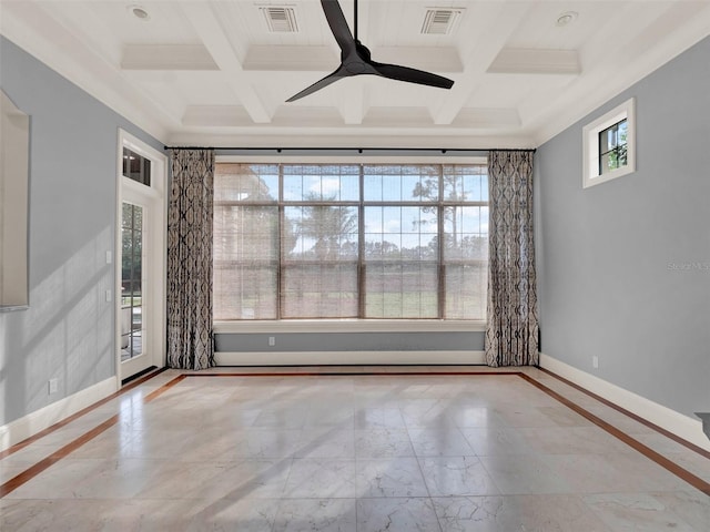 unfurnished room featuring a healthy amount of sunlight, visible vents, and baseboards