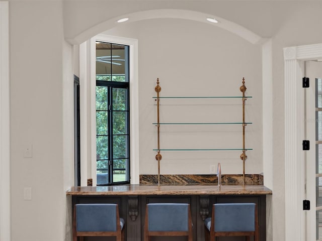 interior details with arched walkways and wet bar