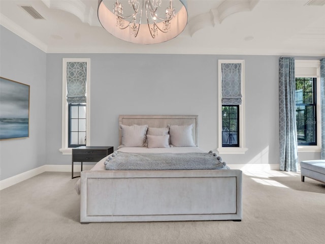 carpeted bedroom featuring multiple windows, visible vents, baseboards, and an inviting chandelier