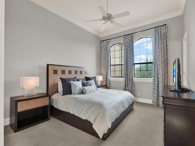 bedroom featuring carpet flooring, a ceiling fan, and baseboards