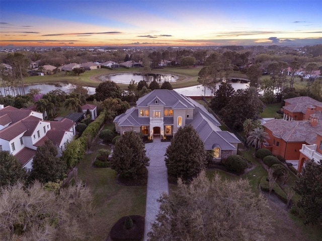 drone / aerial view with a water view