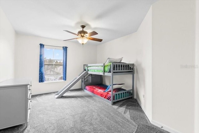 bedroom featuring carpet flooring, a ceiling fan, and baseboards