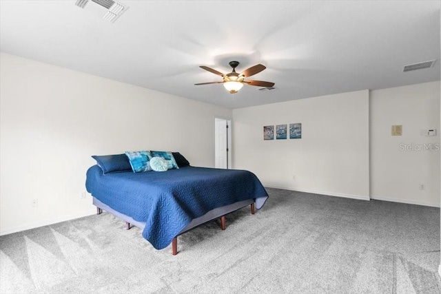 bedroom featuring a ceiling fan, visible vents, and carpet flooring