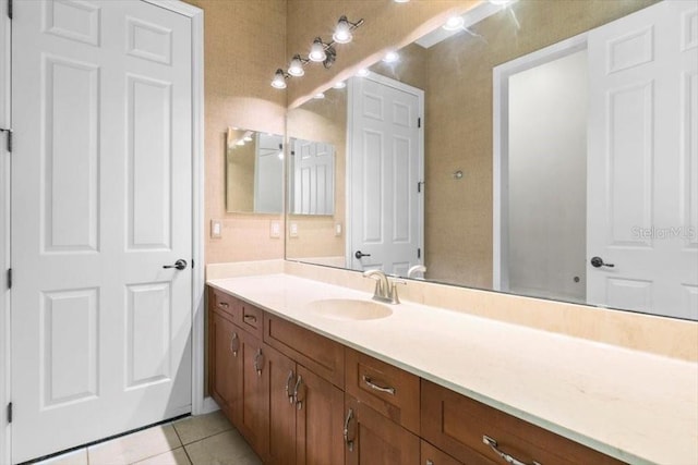 bathroom with vanity and tile patterned floors