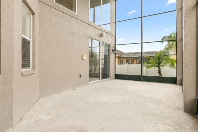 unfurnished sunroom with a healthy amount of sunlight