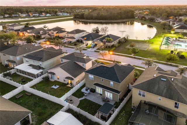 bird's eye view with a residential view and a water view