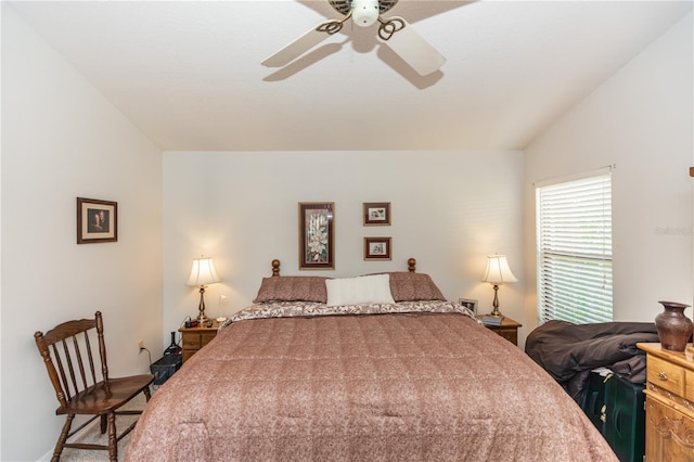 bedroom with ceiling fan and lofted ceiling