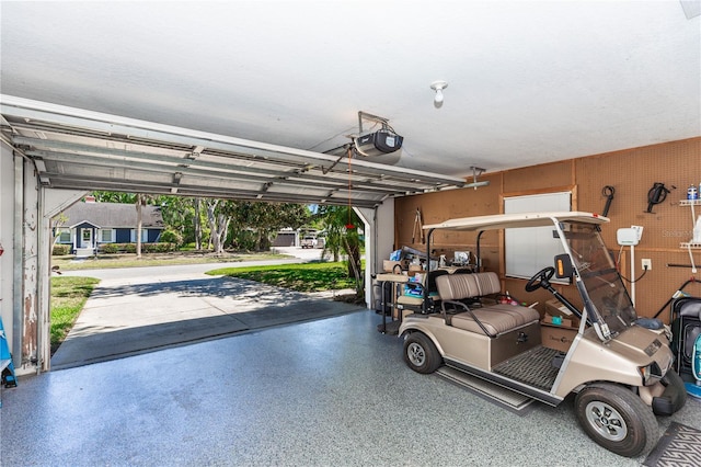 garage featuring a garage door opener