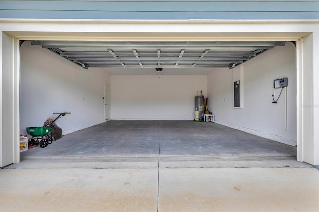 garage featuring electric panel, water heater, and a garage door opener