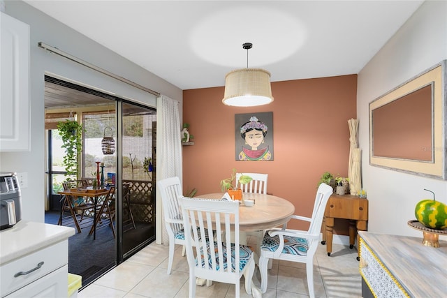 dining space with light tile patterned floors