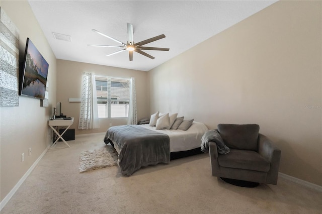 bedroom with carpet, visible vents, ceiling fan, and baseboards