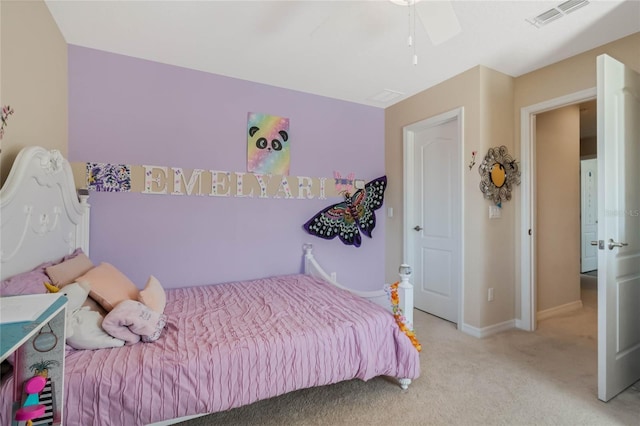 bedroom with a ceiling fan, baseboards, visible vents, and carpet flooring