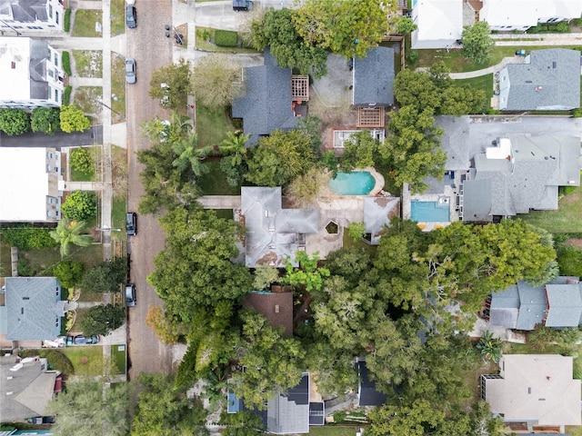 birds eye view of property with a residential view