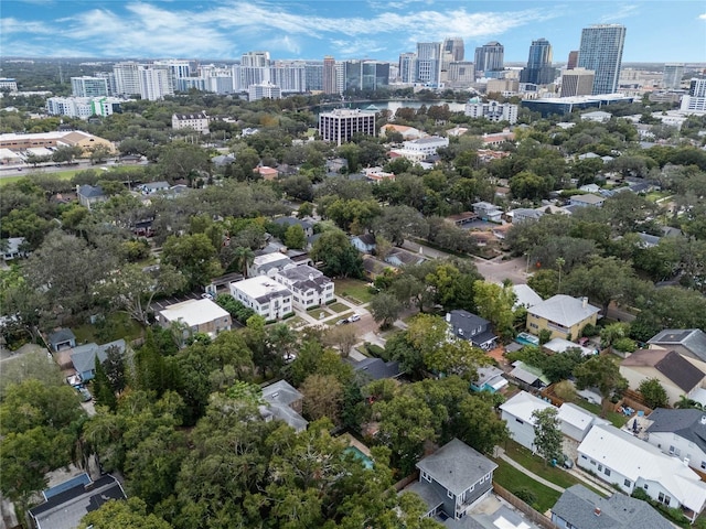 birds eye view of property with a view of city