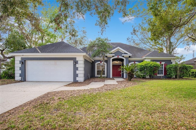 ranch-style home featuring concrete driveway, an attached garage, a front lawn, and stucco siding