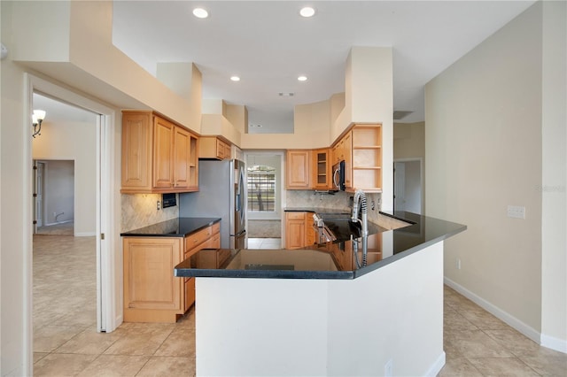 kitchen featuring open shelves, tasteful backsplash, dark countertops, appliances with stainless steel finishes, and baseboards