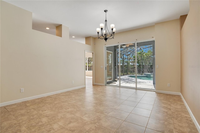 unfurnished room featuring light tile patterned flooring, a notable chandelier, and baseboards