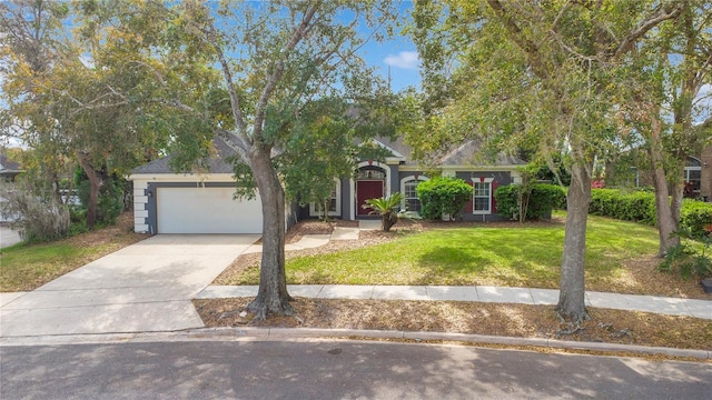 obstructed view of property with concrete driveway, an attached garage, and a front lawn