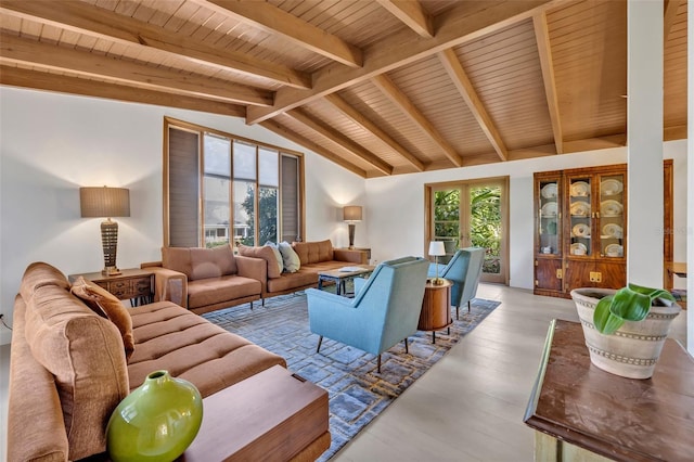 living area featuring lofted ceiling with beams, wooden ceiling, and wood finished floors