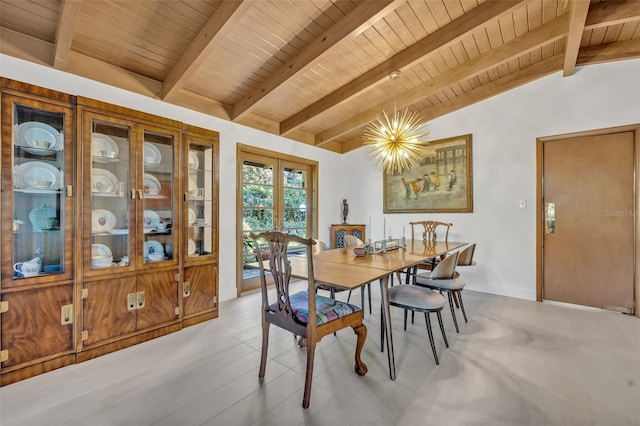 dining area featuring vaulted ceiling with beams, wood ceiling, a notable chandelier, and french doors